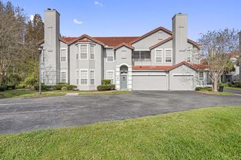 A large with a garage and a driveway